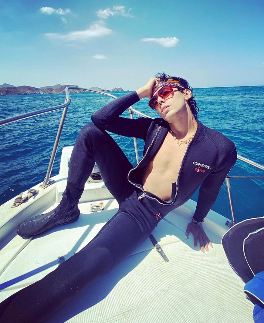 Daniel Nieto poses on a boat